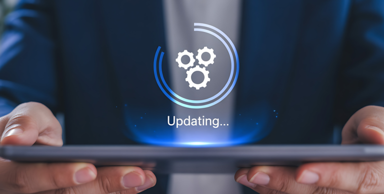 Tablet corporativo exibindo atualização de sistema, representando a importância da atualização de dispositivos corporativos para segurança e desempenho.